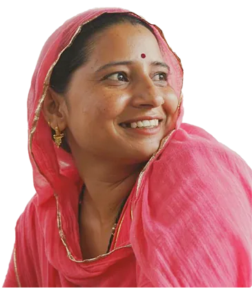 A smiling woman in a pink dupatta