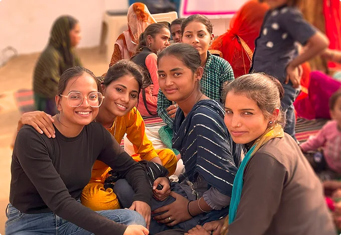 Young women sitting together